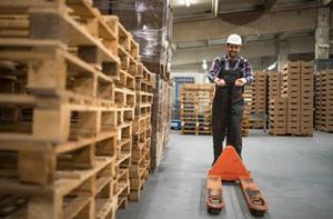 Optimal Servicing Frequency for Pallet Trucks